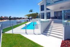  Broadbeach, Gold Coast QLD 4218 $2,150,000 Carmel house is a new contemporary designed home located in one of the most prestigious areas of Broadbeach Waters on the Gold Coast, Australia. This magnificent house is positioned on the wide water bend of the canal which opens to a 270 degree view of beautiful wide waterways. All fittings and finishes were completed with the owner’s highest quality requirements. The main features of the house includes: ·       Well-designed floor plan with careful consideration given to comfortable family living ·       Spacious open plan living and dining areas with the floor to ceiling windows which highlight the stunning water views ·       Luxurious kitchen with Ceasarstone bench top plus an impressive island bench with a quality dual sink, high quality Bosch appliances and six burner gas cooktop ·       Second living / sitting area which could be used as a formal lounge or home theatre ·       A well-appointed office with separate entrance away from the main living areas 