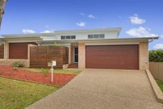  1/25 Kingfisher Road Port Macquarie NSW 2444 For Sale - $389,000 bed 3  bath 2  car 2 Property ID: 	 1P1487 Property Type: 	 Villa Garage: 	 2 Construction: 	 Brick veneer Outgoings 	 Council Rates: $2600 Yearly Features: 	 Built-In Wardrobes Close to Transport Close to Shops Close to Schools Ensuite STUNNING DESIGN WITH A BUSHLAND BACKDROP At Kingfisher Drive you will find this beautifully finished three bedroom villa in a complex of only 2 that cleverly combines modern architectural design elements with functionality.  The property features a modern facade with timber features set against the hues of a contemporary Australian coastal design. Stepping inside, you are immediately impressed by the quality of the villa's inclusions and also the unique design features that create a sense of light and space. High gloss floor tiles feature throughout with a stunning open plan living area opening out on to a timber deck. Here you can fully appreciate the architectural elements that make this villa special, with soaring skillion rooflines and design features that fill every room with natural light.  There is a separate dining-family area that seamlessly integrates with the contemporary kitchen. The kitchen features beautiful stone benchtops, an L-shaped island bench, electric cooktop, high raked ceilings and beautiful pendant lighting.  There are three queen sized bedrooms with the master featuring a flawlessly finished open plan ensuite with cantilevered vanity, corner shower, generously sized built-in robes and a feature void that fills the room with natural light. The same quality extends to the main bathroom which comes complete with sizeable linen storage.  There is a rear deck leading down to a low maintenance grassed area. This property is just minutes from town, shops and schools and the new University is just so close. Live in or invest, currently returning $395pw to an excellent tenant who would love to stay on.  Council Rates $2,600pa  Strata is newly registered (shared costs of insurance only) 