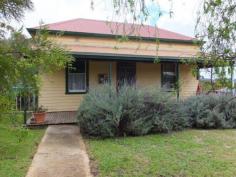  49 Dunn St Ravensthorpe WA 6346 Lovely Lavender Cottage This cottage on a full quarter acre block ( 1012sqm) just oozes character and charm. And with four good sized bedrooms its just waiting for your family to move in and give it the love it deserves. Surrounded by old fashioned gardens with lavendar, roses, frut trees, olives and vines its a great spot for those seeking some self sufficiency. The home has original polished floorboards and some floating floors, high ceilings and some pressed tin walls, a modern reverse cycle air con, a good tile fire for those chilly winter nights and a lovely verandah with panoramic views across the Ravensthorpe Ranges. There's also a decent garden shed, a big yard, and rear lane access. Perfect for the handiman or woman and an ideal house for First Home Buyers -- let us help you into your first home. Its easier than you think! If you want to break out of the rent cycle, this home is a great opportunity. Call for appointments to view. Other features: Close to Schools,Fireplace(s),Garden 