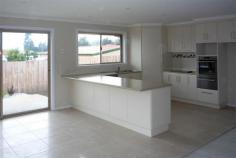  2/11-13 Edith Court Legana TAS 7277 LEGANA GROVE ESTATE Large New Unit! Positioned in a prime new area of Legana this large new three bedroom townhouse is positioned in a quiet cul-de-sac within walking distance to shopping complex including a Woolworths Supermarket and many other specialty shops. Extra large living areas including beautiful kitchen with soft close drawers and cupboards and Westinghouse appliances including dishwasher and wall oven.  Spacious main bedroom with en-suite and all three bedrooms with built-in wardrobes. Reverse cycle heating and cooling (heat-pump) to keep you at a comfortable temperature all year around. Double garage with store room, remote control door and direct access to inside. Fully landscaped and low maintenance. Wheelchair friendly. You get to choose the carpet! A stunning large new unit in prime position. General Features Property Type: Unit Bedrooms: 3 Bathrooms: 2 Building Size: 201.60 m² (22 squares) approx Indoor Features Ensuite: 1 Outdoor Features Garage Spaces: 2 $330,000 