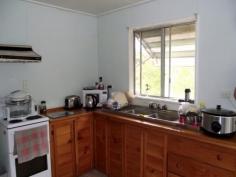  1347 Summerland Way Wiangaree NSW 2474    $215,000 Located in the tranquil village of Wiangaree only 10 minutes from Kyogle this package of home and block present great value with future development potential and either live in or rent out the neat 2 bedroom home.A very good starter or one for the keen investor. Property Details Bedrooms 		 2 Bathrooms 		 1 Car Ports 		 1 Land Area 		 2015 m2 Agent Name:  SIMON TOUGH Phone:   02 6632 1077 Mobile:  0402 706 565 
