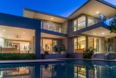  42 Buccaneer Way, Coomera Waters QLD 4209 NORTH FACING WATERFRONT TREASURE
				 *
 North facing waterfrontage is always in demand but hard to acquire* A 
creation of Jared Poole Design respected both in Australia & 
overseas* Pre 
					* North facing waterfrontage is always in demand but hard to acquire 
* A creation of Jared Poole Design who is respected both in Australia & overseas 
* Premier waterfront position in Coomera Waters' most sought after street 
* An inviting home of grand dimensions combining class & livability 
 
This proud home provides all the delights of modern day living with great attention to detail. 
Ground floor living features inviting home theatre, complete with 
built-in wet bar, the ideal 'home office' with external entry, an up to 
the minute kitchen with abundance of storage, spacious family-dining 
with direct access to 'alfresco' entertaining beside the sparkling pool.
 The main bedroom also enjoys direct access to the pool and is complete 
with glamorous en-suite and huge walk-in robe. 
Uncrowded upstairs features the ultimate retreat for a range of in-door 
activities, or gatherings of friends and family as it extends onto a 
large balcony overlooking the pool & waterway. Two of the four 
upstairs bedrooms look onto the waterway, with the guest's bedroom 
featuring en-suite and private balcony. 
Everyday here has a different view, reflecting the mood of the weather. 
Afternoons have cooling sea breezes, evenings have pleasant sunsets 
& night time enjoys the moonlight glittering upon the water. It is 
easy to understand why people pay a premium price to live in such an 
idyllic situation. The 12 metre powered pontoon has a jet ski dock 
installed. From here it is 'bridge free' boating access to the Coomera 
River & on to 'The Broadwater' or Sanctuary Cove. This prime 
location is also in short walking distance of Sandy Beach, the Harbour 
Village Shopping and the Recreation Club, that is for exclusive use of 
Coomera Waters residents. 
 
Life is good here! ...So live the dream! 