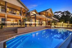  26-28 Daley Avenue Daleys Point NSW 2257 Exquisite World Class Waterfront Estate Introducing Paradiso Sul Mare, unrivalled in its dedication to opulence, this stately residence offers the ultimate in waterfront living. Wrapped in spectacular panoramas and set on almost half an acre in a magnificent North facing position, the superbly appointed home offers every conceivable luxury. With finely crafted custom fixtures sourced from exotic locations around the globe, this property is absolutely superior in quality and architectural brilliance!! The home was built to exacting standards and boasts a solid concrete construction just like a commercial development, phenomenal granite counter tops and exquisite Italian marble floors.  The home is immense with over 690 square metres of floor space spread over 4 levels. A few of the grand features include massive vaulted ceilings with mezzanine areas, an elegant staircase with Jarrah hand rails (a bit like the one in "Gone With The Wind"), 6 spacious bedrooms including the most decadent master suite with spa bath, several private balconies overlooking The Brisbane Waters, lavish cinema room with wet bar and an opulent fully lined Jarrah office. This one of a kind masterpiece built by the team that became ... show more View Sold Properties for this Location View Auction Results General Features Property Type: House Bedrooms: 6 Bathrooms: 5 Land Size: 2018 m² (approx) Outdoor Features Garage Spaces: 4 Just Listed 