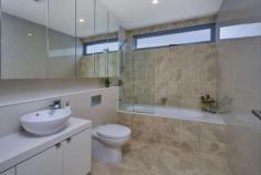  1/96-98 Loftus Street Bundeena NSW 2230 Bundeena’s finest – inspiring new luxury penthouse The ultimate escape, this brand new two level luxury pet friendly residence commands a coveted position, just footsteps from the beach, park and ferry wharf. Created in a sophisticated contemporary style, the remarkable property offers a supremely spacious floor area of 390 sqm and incorporates the very finest finishes throughout. Perfect for those who like to entertain in grand style, the home features an immense open plan living space which stretches out to a large wrap-around deck with sparkling views across the bay. Immense open plan living, lounge and dining space with stunning outlook 5 large bedrooms, main with water-facing balcony, WIR and deluxe ensuite 2nd bedroom with WIR, 3rd bedroom with ensuite, 5th bedroom/home office 4 luxury bathrooms, each featuring marble tiling and designer fixtures Deluxe entertainers’ kitchen with marble counters and bar seating area Butler’s pantry, Ilve integrated dishwasher, ovens and induction cooktop 8 inch wide oak floorboards, zoned ducted air-conditioning, private lift Advanced security with video intercom, CCTV, swipe card access and alarm Secure automatic garage with direct lift access and parking for six cars Private entrance featuring a stylishly landscaped native garden Sensational Sydney getaway, just a 10 minute ferry ride from Cronulla Metres from a great selection of local shops, cafes and restaurants 