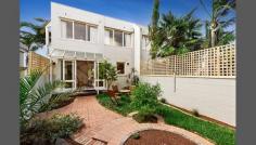  1B Wordsworth Street, St Kilda, VIC 3182 Flooded with gorgeous daylight in every direction, this designer townhouse showcases a smart designer living and picture-perfect bay views, right at the most premier beachfront location of St Kilda! Not often such a rare opportunity would arise in the tightly-held foreshore market, with 6 kilometres of uninterrupted beach esplanade at your doorstep! Let the well-groomed sun deck patio welcome you to a generous front lounge dressed with luxurious bamboo floorboards and clean open lines of bay side architecture. The spacious dining hall at rear will also impress, with a fully-equipped gas kitchen, high-sheen polished granite tiles and a trendy cocktail bar - all overflowing onto a huge sunlit alfresco courtyard and manicured gardens, ready for every outdoor entertainment occasion or simply a perfect day in the sun, right at home. 