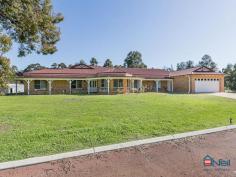  348 Soldiers Rd Cardup WA 6122 THE GRAND AUSTRALIAN! To perfectly sum up what is the quintessential Australiana home on Acreage….This is it! Near 6 Acres of productive loam soil, with good fencing across 7/8 paddocks. Executive Australian Colonial style high spec 4 bedroom, 2 bathroom residence with over 280sqm of internal living. 4 Stables, (2 walkin-out) and tack room (Wc&shower). Big 8x16m Shed/workshop. A bore for water to around 140ft deep, 40000lts of rain water storage,  The luxury home features, Double brick and colorbond construction, Double entry doors, Regal lounge/theatre with recessed ceiling, Study, Master suite with spa bath, Spacious kitchen/family/meals area, Huge gamesroom(30sqm) Activity room, Kingsized No’s 2&3 bedrooms, Spacious laundry, Separate store to the double garage, 33 course ceilings to all living rooms, Refrigerated air conditioning, Ducted vacuum,  Verandahs to 3 sides, Stylish gabled patio over paving, Solar hot water, Further more the location is ideal with close proximity to Southwest hwy and the growing community of Byford. General Features Property Type: House Bedrooms: 4 Bathrooms: 2 Building Size: 280.00 m² (30 squares) approx Land Size: 2.40ha (5.93 acres) (approx) Price per acre: $160,202 Indoor Features Toilets: 2 Outdoor Features Garage Spaces: 6 $950,000 