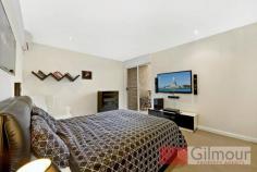  42/ 22-26 MERCER STREET CASTLE HILL NSW 2154 Set within a sought after security complex, in a commanding area of Castle Hill is this sensational apartment that offers outstanding style & living. The light, bright & airy ambience of this freshly painted apartment is enhanced by the plantation shutters & bamboo floorboards throughout the inspired open plan living & dining areas. The state of the art kitchen is completed by gas cooking, CaesarStone bench tops and stainless steel appliances. Opening out from the living area is the spacious, covered balcony, ideal for sitting back & relaxing with a drink in hand and entertaining friends & family. You can also utilise and enjoy the great facilities within the complex that include a gym, pool and recreational games room. Both of the bedrooms features built-in robes and the enviable master suite boasts an ensuite and a private balcony. The total size of the apartment is 163sqm which includes a double lock-up garage with an automatic door and a separate storage area. Other fantastic features include split system air-conditioning, gas heating outlets, an intercom and quarterly strata rates of $958.15. A sophisticated and low maintenance environment that is within moments walk to Castle Towers, local schools and the future train station. This deserves your attention, call to inspect today!   FOR SALE | Offers Over $670,000 