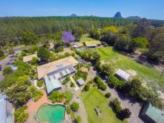  42 Johnston Rd Glass House Mountains QLD 4518 
								42 Johnston Road Glass House Mountains 
								 
								Huge 3 bedroom home on 3679m2. This home is very private set 
amongst trees, security gate and stone walls. 

This house has that real colonial country fee. At the front of the 
property is a verandah that runs the full length of the house. For 
extra security there are crimsafe doors to the front and back doors and 
some security screens to the windows. Air conditioning to 2 bedrooms, 
built in robes, ensuite and walk in robe to main bedroom. The lounge 
has a fireplace to keep you toasty during those cooler months.

 Main bathroom has a seperate shower, bath and toilet. Internal 
laundry, tiled living areas seperate timber kitchen, dining and lounge 
with fireplace for the cooler months. At the back you have a fully 
enclosed entertainment area with pool table room. 

There is an inground salt water pool, bore water, water tank, 2 x garden
 sheds, 3 bay shed/carport at the rear of the property and solar power. 
 Finally there is also a double lock up garage. 

This property is located in great position in the Glass House Mountains 
with easy access to Bruce Highway. 20 minutes Drive to Caloundra and 40
 Minutes to Brisbane Airport. Nestled amongst National Parks, walking 
tracks and Mountains to climb what more could you want!

This home is Jam packed with features you must have your inspection now.
 

								 