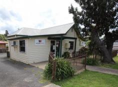  20A Mitchell Street Eden NSW 2551 Perfectly located with highway frontage offering terrific exposure. 
Close to Eden's main street. Currently established as a commercial 
premises with existing tenants returning just over 6.0% net, easily 
converted to cottage living. Super tidy throughout comprising large 
entrance/waiting area, receptionist office, two more offices, storage 
areas, kitchen and bathroom facilities, R/C A/C and security system. 
Neat landscaped gardens, fully fenced and ample bitumen sealed off 
street parking providing an affordable investment with income. IT'LL 
WORK FOR YOU! 
			
			