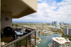  142/2 Admiralty Drive, Surfers Paradise QLD 4217 Offers over $700,000 Situated in one of the most iconic buildings on the Gold Coast, Atlantis West, this apartment has it all. 270 degree North East to North West views. Ocean to TSS and Beechmont beyond. With two large bedrooms, two bathrooms (one as an ensuite), massive walk in wardrobe, separate internal laundry and a double lock up garage with lots of built in storage and three solid walls & security roller door, there has been nothing left to chance in this property. At over 130 square metres internally and 145 square metres including the three balconies, the apartment is generous to say the least. Beautiful Italian tiles throughout most of the apartment, the living is easy. Separate grand entrance and huge family/ living room. Open plan kitchen and dining area that makes entertaining a breeze. Quality appliances throughout the kitchen. All built in. Large built in storage cupboards, one acting as a concealed office/ computer desk. Bose integrated sound system and lush curtains. Granite bench tops throughout. 
