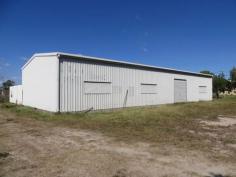  5-9 Third Avenue, Home Hill, QLD 4806 The possibilities are endless, turn this freehold 8,977m2 industrial 
block and shed into your next business venture. Subdivide with council 
approval, this property is a short walk to the town centre. With bitumen
 frontage this block has all necessary conveniences - water, sewer and 
power. Improvements include a 24m x 10m steel shed with concrete floor, 3
 phase power and office area. An area adjacent to the shed has security 
fencing. An existing tenant is in place for those interested in 
investing. Call immediately to inspect. 
 