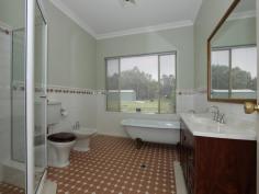  21 Corte Close Brigadoon WA 6069 Immaculate Country Style Unique Luxury Home Outstanding value.... over 10acres of fertile Swan Valley land with a quality residence ready to fulfill your dreams. This level fully fenced property is something special and is ideal for equine interests or just having space from the neighbours. Positioned in a quiet location with easy access to the State Equestrian Centre, only minutes away from shops and schools. Enjoy the convenience of discovering the rich fusion of award-winning wineries, fine foods and amazing art offered by this region - This property offers a rural lifestyle with metro convenience. The Residence features: Feature glass entry doors and impressive 31 course ceilings with ornate cornices Federation tiling in the Entry, Study and Main Bathroom Front study/office Large formal lounge room with open fireplace Open plan living with wood heater and casual meals area Great kitchen features walk in pantry, stainless steel wall oven, 900mm gas cooktop and Miele rangehood Master bedroom features a fully fitted out walk in robe and ceiling fan Main Bathroom with bidet, claw bath and glass screened shower Bedrooms 2 and 3 with double built in robes. General Features Property Type: Other Bedrooms: 3 Bathrooms: 2 Land Size: 4.10ha (10.13 acres) (approx) Price per acre: $165,350 Indoor Features Ensuite: 1 Alarm System Built-in Wardrobes Air Conditioning Open Fireplace Outdoor Features Secure Parking Garage Spaces: 2 Shed $1,675,000 