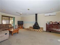  49 Avonmore Street Edens Landing QLD 4207 The Perfect Home for Our Queensland Summers Summer in Queensland is all about the outdoors - playing in the sun, splashing in the water, entertaining and creating memories with our families and friends - and this home ticks all the boxes! Four bedrooms - all with timber flooring - ceiling fans for those balmy summer nights - all with room for a queen bed. The spacious master bedroom offers walk in robe and ensuite bathroom. There is a massive formal living room, complete with air conditioning and fire place - big enough for a pool table! A second living area leads into the meals room. Adjacent is the great sized kitchen, with plenty of cupboard and bench space and a servery out to the covered patio. Outside is where this home really comes into its own - multiple entertainment areas, grassed areas with room for swings/trampoline - and the large sparkling in ground pool just waiting for a fun-filled summer! Double garage - plenty of room at the side for your boat, trailer or caravan.  Located on a huge 899m2 corner block, inspection is a must, as "looks are deceiving" from a simple drive by. This Summer - will you could be enjoying a BBQ while you watch the kids play in the pool - or will you . General Features Property Type: House Bedrooms: 4 Bathrooms: 2 Land Size: 899 m² (approx) Indoor Features Ensuite: 1 Air Conditioning Other Features Property condition: Good Property Type: House House style: Lowset Contact Agent 