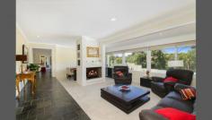  318A Pittwater Rd East Ryde NSW 2113 IDYLLIC FAMILY RESIDENCE Spread over one impressive level, this stunning family residence enjoys a sequence of indoor and outdoor living zones, with an enticing layout for those who love to entertain. Beautifully presented interiors offer immediate enjoyment, with a sparkling swimming pool taking centre stage outdoors. Set against an idyllic backdrop this elevated position enjoys serene north east views over Lane Cove National Park, with Ryde East Public School, transport and Macquarie Hospital close by. - Expansive living areas, formal lounge room  - Master with walk-in robe, ensuite & adjoining spa room  - Private parents retreat with separate cedar lined spa room, featuring 8 jet in-built spa - Premium Caesarstone kitchen with stainless steel appliances - Chic bathrooms, home office - Large billiards room/library, air conditioning  - Glass fenced pool with travertine surrounds, tropical gardens, alfresco deck - Double lock up garage plus two car spaces ** Agent's interest **  For further information please contact Paul Nees 0432 995 847 or Alex Banning 0434 131 903, Ray White Lane Cove 9428 4100 