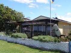 54 Haiser Road, GREENWELL POINT Recently refurbished charming four bedroom on the Crookhaven River waterfront reserve 
* The private front courtyard is a tranquil getaway from the hustle and bustle of modern life 
* The delightful open plan kitchen, dining and lounge room have polished floorboards & R/C air 
* The living area flows to the perfect entertainment deck with magnificent waterviews 
* An inviting central hallway joins the rear of the house to three courtyards and the living areas 
* The house is bagged brick, has a new iron roof, solar hot water and electricity 
* A carport is attached to the single garage with a large workshop area for the handyman 