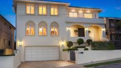  26 Amour Ave Maroubra NSW 2035 Spanning over 3 glorious levels in one of Maroubra / South Coogee's 
premier streets resides this magnificent coastal property. Showcasing a 
beautiful blend of modern and classic style this outstanding home exudes
 quality, offers luxurious living and is conveniently positioned within 
moments to beaches, coastal walks and parklands. - Private resort style entertaining, solar heated swimming pool - Grand foyer, spectacular spiral staircase, soaring ceilings - Gourmet kitchen with Gaggenau appliances, walk-in pantry and open breakfast bar - Selection of informal / formal lounge, family and dining area's - Master bedroom complete with full marble en-suite and walk-in wardrobe - Ocean and headland glimpses - Huge rumpus / games room allow for an easy conversion into a self contained teenage retreat or in-law accommodation -
 Additional office, gymnasium, child friendly outdoor play area, store 
room, AMX lighting, sound and heating system, jet master fireplace - Internal access to an oversized double lock up garage, full security system, integrated reverse cycle air - Register prior to inspection - Land size 582 sqm Approximately - Council $618.30 per quarter - Water $176.56 per quarter - Jason Black 0414 891 797 or Brent Foster 0411 032 474
 
