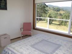  235 Curricabark GLOUCESTER NSW 2422 $499,000 Set back off the road to give you privacy, peace and quiet and an opportunity for a change of lifestyle, this home is spacious and welcoming. A lovely light and sun filled open plan home with air conditioning and combustion heater for those chilly months. Polished hardwood floors are a feature. The kitchen is well laid out, has a dishwasher and lovely big windows overlooking the lovely rural views. There are three generously sized bedrooms. 3 side wrap deck surrounds and an undercover entertaining area out the front. Freestanding four car garage and 100,000 litre water storage, and solar power, this home is almost fully self-sufficient. Ample water storage = no water rates Solar power panels and solar hot water = minimum electricity bills Fully electric = no gas bills 