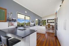  Acreage Semi-rural - BLACK MOUNTAIN QLD Set
 in one of Black Mountains most sought after pockets on 1.98ha (approx. 5
 acres) this stunning home will impress. Set high capturing the breeze 
with an abundance of privacy, stunning skyline panoramas, level entrance
 to the home with deep elevated covered decks for entertaining. 
Immaculately presented 10.5 year old home, extra high ceilings with 
skillion roof, polished timber floors in open plan living/dining areas, 
double sliding doors providing direct access to large covered deck 
perfect for al-fresco entertaining. Central stylish kitchen with 
breakfast bar, stainless oven, heaps of storage and views to inspire the
 cook in you. Four good size bedrooms all with built-in robes and the 
master retreat with an en-suite, fans in all the rooms. Extras include
 solar hot water, 20,000 gallon water tank, 2 dams, full boundary 
fencing, steel frame, shadow cladding on the outside with iron roof, 
double carport, full wall linen cupboard, enclosed laundry. Great 
views and beautiful sunsets. Five minutes drive to Cooroy or Pomona 
and approximately 30 minutes to Noosa beaches and restaurants. Ref: 507 