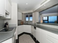  Grand Mariner 12 Commodore Drive   PARADISE WATERS   Qld   4217 ... WITH OWN PRIVATE MARINA BERTH . Currently rented at $550.00 per week. The perfect opportunity for an investment in a premier upmarket location. More than a place to live ‘GRAND MARINER’ on Paradise Waters IS A WAY OF LIFE for those who demand and deserve the best, make it your own!! A first-class residential building with uncompromising elegant décor and luxurious resort amenities; 24 hour on-site security, lagoon swimming pool, an indoor pool, spa, sauna, gymnasium, steam room, games/billard room, BBQ and entertaining areas, two tennis courts, golf swing facility, herb garden and marina. A prestigious location and centrally placed; walk or bike everywhere. *Coveted Eastern corner with spectacular 180 degree direct ocean and skyline views  * Impeccably presented apartment newly redecorated and ready to move into and enjoy  * Spacious 150m2 of living on the 24th Floor with direct views from every room  * 2 Bedrooms, walk-in robes, 2 bathrooms; large en-suite with double basin and spa bath  * Large kitchen with plenty of bench and cupboard space, Bosch appliances  * Open plan living and dining  * Wide balcony to enjoy expansive views  * Ducted air-conditioning, double door entry  * Separate laundry room with cupboard and storage space  * Own 7 Metre x 3 Metre Marina Berth  * 2 Car Parking spaces; wash bay facilities * Walking distance to Main Beach Cafes, Restaurants, Macintosh recreational park and the beach  * Public transport close by; light rail tram station… No need for a car!! 