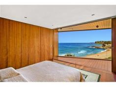 32 The Serpentine Bilgola NSW 2107 SHEER BEACHFRONT LUXURY Created by CABE, one of Australia’s preeminent development companies and winner of 31 industry awards, this is the ultimate seaside retreat for the cutting-edge Connoisseur.  Apart from the breathtaking Oceanfront location and spectacular views across the Pacific Ocean and pristine coastline, the attention to detail and high quality fit-out, is nothing short of stunning.  No expense has been spared in its creation, from the level street access with elevator to all floors, to the automated doors revealing a view-swept infinity pool and magnificent oceanfront lawn.  Accommodation comprises 5 bedrooms, 4½ bathrooms, extensive living and entertaining areas, separate Home Office, thermo-controlled Wine Cellar, media room, gourmet kitchen and enormous storage areas.  A rare offering in such a prized position, this luxury property is one that has definitely raised the bar for excellence in this country. *** BE SURE TO VIEW OUR AMAZING 2min VIDEO TOUR ONLINE AT maxwalls.com/id141 