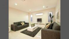  13 Springwater Drive, Lara, VIC 3212   $395,000-$405,000 Whether you are looking for your next investment or family home, don't look past this stunning as new ex-display home proudly built by GJ Gardener Homes. With fantastic tenants in place till June 2015, , this quality yet private home with a spacious floor plan design comprises 3 good sized bedrooms, master with full ensuite and walk in robe while remaining bedrooms are located at the rear of the home and feature built in robes. Two completely separate living areas with front carpeted lounge having sliding doors to the fantastic concreted and decked private alfresco area and a large tiled open plan living and meals area adjoins the stunning kitchen equipped with ceaser stone benches, quality stainless steel appliances including gas hotplates, electric under bench oven, rangehood and dishwasher, walk-in butlers pantry with shelving. 