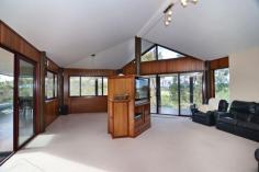  1657 Nethercote Road South Pambula NSW 2549 River Of Dreams Been looking for something special to call home? Take a look at over 14 acres with incredible Yowaka River and hinterland views, an open plan 4 bedroom home with high ceilings, total privacy, solar heated concrete pool and less than 5km on sealed road to Pambula and 8km to the beach! The home utilises natural timbers, has wide under roof verandahs with stunning views down to the river, quality fixtures and fittings that include double glazed windows. The 3 downstairs bedrooms have built-in robes while the upstairs area is a bedroom and living area in one with ensuite, walk through robe and own balcony! The solid timber kitchen includes stainless steel splash back, gas top with electric oven, twin draw dishwasher and breakfast bar that adjoins the living area looking onto the surreal landscaped pool area with lush lawns and natural beauty all around. A huge brick 4 car garage provides secure parking and storage while a separate colorbond shed and self contained 1 bedroom cabin complete with own kitchen and bathroom brings endless possibilities to this unique property. Mains power, both a wood fire and reverse cycle air con, over 90,000 litres of tank water ... show more View Sold Properties for this Location View Auction Results General Features Property Type: Acreage/Semi-Rural Bedrooms: 4 Bathrooms: 2 Land Size: 5.81ha (14.34 acres) (approx) Price per acre: $47,071 Indoor Features Air Conditioning Open Fireplace Outdoor Features Garage Spaces: 6 Other Features Balcony, Terrace/paved, Outdoor entertainment area, Fenced, Granny flat, Low maintenance $675,000 