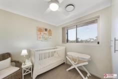  3/12 Margate Ave Holsworthy NSW 2173 Combining Looks, Lifestyle and Location, is this immaculate and modern 3 level home situated in the popular Mornington Estate, just a stone's throw away from Holsworthy Station. Boasting the following items of interest; - 3 good sized bedrooms, 2 with ceiling fans - Main bedroom providing Walk in robe and Ensuite - Modern Kitchen with ceaser-stone bench tops, S/Steel gas appliances and double drawer dishwasher - Spacious open plan living with floating timber floors - Ducted A/C, Alarm and Video Intercom - Singe remote garage - Roof terrace leading onto rear low maintenance yard featuring undercover Jacuzzi, perfect with summer almost upon us! - Access to resort style facilities including Tennis court and Swimming pool - Within a few minutes' walk to Holsworthy Train Station with a direct line into Sydney's CBD - Low strata levies of approx. $420 per quarter Freshly painted and vacant this beautiful home presents the perfect opportunity for the first home buyer or investor alike. Hurry! Inspect now before this train leaves the station!   
