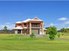  18 Ascot Crescent Samford Valley Qld 4520 Situated in the prestigious Royal Estates in Samford Valley on an elevated 9,413m2 northerly aspect, this magnificent contemporary property ticks every box when it comes to purchasing your next family home. Attention to detail is evident throughout this home. The design is generous and beautifully proportioned with ample space for both parents and children. From the cleverly designed kitchen, framed by the open veranda doors, you will embrace views of the distant mountain ranges - a surreal picture postcard in both daytime and evening. - 4 Spacious Bedrooms - master bedroom featuring walk in robe and ensuite with spa bath - 3 Bathrooms throughout (2 of which are ensuite) and 1 conveniently located downstairs - Large informal family living and dining area adjacent to the kitchen - Modern kitchen with Bosch appliances and walk-in pantry - Home office - Media room/formal lounge with surround sound and noise reducing insulation - Huge downstairs entertaining area with wall mounted TV and large kitchenette (with dishwasher) flows seamlessly out to the alfresco area - High ceilings throughout 