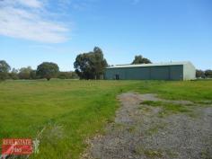  1973 Great Northern Hwy Bullsbrook WA 6084 Perfectly positioned on the south side of Bullsbrook, is this superb piece of Australian land. With
 flat land adjoining the highway there is enough space to have a buffer 
zone from the main part of the block. The block is separated by a brook 
and the back part of the property is gently sloping in some parts and 
lightly treed. The standout feature of the property is the 
MASSIVE workshop with an office space and full bathroom all inside. 
Outside there are also small carriage like rooms which could also be 
used as extra workspace as there is one that's just a room, one that is a
 room...
 
 
 
