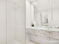  1912/1 Freshwater Place Southbank VIC 3006 Luxury corner apartment with 19th floor city backdrop - approx 92sqm Perched on the banks of the Yarra River in a prestigious resort style address, this flawless corner apartment embodies a sophisticated open gallery design with impressive proportions, exemplary finishes and floor-to-ceiling windows throughout.  Captivating city views wraparound the spacious living and dining areas to create a supreme entertainers’ retreat of sheer opulence. An exquisite marble island kitchen serves as a grand space with stainless steel gas appliances and superior fittings. Residents enjoy access to a range of facilities on level 10 including a gymnasium, pool, spa, sauna, steam room, massage rooms and rooftop garden selection of barbecue amenities with a spectacular view.  There are two generous bedrooms with built-in wardrobes, including the master retreat complete with walk through wardrobe and ultra-stylish ensuite. Additional highlights include a crisp white marble finished bathroom, ducted air conditioning, chic downlights, video intercom, concealed laundry facilities, secure car space and lift access. It presents a solid investment opportunity with high rental returns, or an impressive option for those seeking a prized lifestyle of supreme ... show more View Sold Properties for this Location View Auction Results General Features Property Type: Apartment Bedrooms: 2 Bathrooms: 2 Indoor Features Toilets: 2 Air Conditioning Outdoor Features Garage Spaces: 1 Swimming Pool - Inground Other Features Built-In Wardrobes,Close to Schools,Close to Shops,Close to Transport,Secure Parking Offers over $750,000 