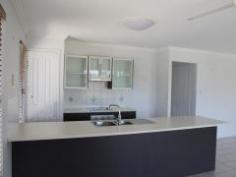  32 Connor Street Zilzie QLD 4710 LIVE BY THE OCEAN A GREAT LIFE IT IS. Perched on the top of Emu Park, this solid high set home boasts views over looking Zilzie area. 4 bedrooms with built-ins, main bedroom with en-suite and walk-in robe plus ceiling fans through out. 1. Open plan kitchen with dishwasher, dining and lounge area.  2. Large bathroom with separate shower and bath tub. 3. Separate toilet. 4. Large veranda with plenty of room for entertaining your guests. 5. 2 car accommodation with roller doors. 6. Plenty of room downstairs under the home to expand to make a rumpus room. 7. Laundry area. 8. Play area for the little children in the back yard.  Call your friendly agent for inspection Laurette. General Features Property Type: House Bedrooms: 4 Bathrooms: 2 Land Size: 584 m² (approx) Indoor Features Toilets: 2 Air Conditioning Outdoor Features Garage Spaces: 2 Other Features Built-In Wardrobes,Close to Schools,Close to Shops,Close to Transport,Garden $495,000 NEG 