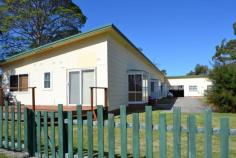  4 Nielson Ln Sussex Inlet NSW 2540 Opportunity to combine investment and holiday enjoyment. 5 x 2 b/r flats with approval for strata subdivision in beautiful Sussex. Situated perfectly near boat ramp with walking track adjacent and own jetty. Includes renovated fully furnished owners unit with attached timber deck. Fabulous holiday destination with St Georges Basin a few minutes by boat and access to ocean to the East. All shops and clubs within easy walk. GAR $55,120 with plenty of scope for growth. 1201m2 lot Will sell quickly so inquire now. Agents interest declared. 