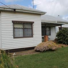  2 CLIFFORD STREET Hamilton VIC 3300 FIRST HOME OWNERS SPECIAL- Its a BEAUTY For bank payments in line with what you would have to pay for rent, this three bedroomed weatherboard home on a lovely corner allotment, could well be your start into the real estate market, or even a first rental investment property. Without really having to do any work, this house could easily be occupied and lived in happily, for quite a long time before the paint brushes or other renovating tools needed to be used.  It has three spacious bedrooms- all able to accommodate a double bed, and two living rooms adjoining each other so that they can form one large “party” room . The kitchen has both electric and wood stoves, and the living areas are warmed by gas heating in the first lounge and a split system and wood combustion heater in the second-all bases covered. Outside, the block has plenty of playing space for the kids and there is a single garage and single carport. This property has the ability to be a good comfortable home for someone, as it has been for its previous owner, or it can be the source of additional income by being improved and lifting it to a higher dollar bracket. It is positioned in a quiet street, very close to Baimbridge College and H.I.L.A.C. View Sold Properties for this Location View Auction Results General Features Property Type: House Bedrooms: 3 Bathrooms: 1 Building Size: 139.35 m² (15 squares) approx Land Size: 850 m² (approx) Price per m²: $222 Indoor Features Living Areas: 2 Toilets: 1 Gas Heating Split-system Heating Split-system Air Conditioning Open Fireplace Outdoor Features Remote Garage Secure Parking Carport Spaces: 1 Garage Spaces: 1 Open Car Spaces: 2 Fully Fenced $189,000 