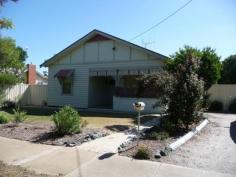  45 Barry St, ECHUCA VIC 3564 $195,000 * 3 Bedroom Home with Timber Floors throughout * Lounge Room has Gas Heater & Air Conditioner * Kitchen Includes Updated Country Panel Cupboards with Electric Cooktop, Underbench oven & Pantry Cupboard along with original Slow Combustion Stove. * Tiled & Upgraded Bathroom * Smaller Allotment with Garden Shed * Rents out at $240.00 per week OR is an affordable First Home Other features: Close to Transport 