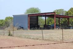  Coomalie Creek NT, 0822 This property which is 185800m2 on the title comes with just under half of klm of highway frontage. There is a large high set shed approx 12 x17mtrs to run the property or a business, the established onsite living quarters includes a fully screened outdoor area leading inside to the open planned lounge, kitchen and one of the five bedrooms, as you enter the hall you access the remaining four rooms and the bathroom. The property has various fruit trees and mango trees that are established and irrigated. These are fruiting now so if you're up for the picking or if you simply want to lease these out there is an opportunity to earn a little bit of extra income. The property is fully fenced with dog/pig mesh including a separate feed paddock to run cattle or horses and a number of veggie gardens and animal pens onsite. Property is being sold on a "as is how is basis". 