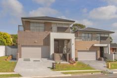  84A & 84B Kendall Drive Casula NSW 2170 2 Auction 22/11/14 at 2:00pm Two Brand New Architect Design Homes With Views! House - Property ID: 760310 These stunning split level homes are ideally situated in the Glen Regent Estate of Casula and feature spacious large open plan designs with outdoor alfresco entertaining areas too. - Tiled lounge, dining and family rooms with high ceilings - Stunning kitchens with stone bench tops, Gas  cooktop and dishwasher - Main bedrooms feature big walk-in robes,  balcony with stunning views, large en-suite and  built-ins to all others - Ducted Air conditioning, Alarmed, Rainwater  tanks and more - Auto Double garage with high ceilings and  enough room to create mezzanine storage above  - Fully fitted laundries and separate powder  rooms downstairs A must to inspect, buy one or buy both, a rare opportunity and ready to move into today! 