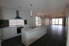  1/8 Smythe Drive Highfields Qld 4352 Are you looking for a Brand new home? Or are you a first home buyer? This unit is newly completed! Featuring: Open plan kitchen, dining and living with air conditioning. Formal Lounge. 3 bedrooms all good sized with ceiling fans and built-ins ( main bedroom has a walk in robe and ensuite with shower/vanity and toilet) 2nd bathroom consists of a bath/shower vanity with a separate toilet. Laundry in the garage. Great outdoor entertainment area, fully fenced private, spacious back yard. Single lock up garage with internal access. *Great investment property rental appraisal $340/week.* *1st home buyers take advantage of this first home owners grant with this unit* 