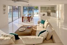  Broadbeach, Gold Coast QLD 4218 $2,150,000 Carmel house is a new contemporary designed home located in one of the most prestigious areas of Broadbeach Waters on the Gold Coast, Australia. This magnificent house is positioned on the wide water bend of the canal which opens to a 270 degree view of beautiful wide waterways. All fittings and finishes were completed with the owner’s highest quality requirements. The main features of the house includes: ·       Well-designed floor plan with careful consideration given to comfortable family living ·       Spacious open plan living and dining areas with the floor to ceiling windows which highlight the stunning water views ·       Luxurious kitchen with Ceasarstone bench top plus an impressive island bench with a quality dual sink, high quality Bosch appliances and six burner gas cooktop ·       Second living / sitting area which could be used as a formal lounge or home theatre ·       A well-appointed office with separate entrance away from the main living areas 