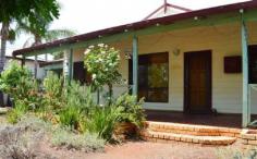  193 Piccadilly St Piccadilly WA 6430 This lovely 4 bedroom, 1 bathroom home on bustling Piccadilly Street is a must see for the growing family or the buyer in need of space.  Greeted by the lovely established gardens tucked behind a picket fence is this picturesque cottage. The home has a lovely porch that runs most of the length of the home with a beautiful wooden floor this is the perfect place to watch life go by with your favourite beverage in hand. The front door leads into the first of two spacious living areas this home has to offer, with lovely polished floorboards that feature throughout the living, dining and kitchen. The living area takes you through to the open plan kitchen and dining area that is both spacious and functional. The kitchen offers separate oven and stove top, dishwasher, fridge recess and breakfast bar. This room is brightened by a skylight overhead and has a sliding door taking you out to the outside entertaining area.  Off the dining room is the huge carpeted family room, this room is huge and big enough to function as a playroom for the kids and/or the adults. The master bedroom and bathroom are located off this room also. The master is spacious with built in robes with mirror door sliders and has the function of an access door through to the bathroom. The bathroom is huge with separate bath and shower, toilet, double door vanity and large double door cupboard storage will never be a hassle again! All four bedrooms have BIRs. The outside entertaining area is fantastic with wrap around veranda and shade sail entertaining areas to soak up the sun after a dip in the sparkling below ground swimming pool. There is a good size grass area for the kids and for the boys a powered workshop and two adjoining single carports for your toys, there is also a smaller garden shed to the rear and rear lane access. Don’t miss out on this feature packed home close to shops, oval, hospital and a stroll away to the CBD contact Lucinda now to secure your own private viewing on 0409 206 942. 