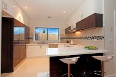  1-6/24-26 Don Street, Reservoir, VIC 3073 Flexible floorplans with bedrooms & bathrooms both downstairs & upstairs sun filled large living & hotel style fully tiled bathrooms makes living in this boutique development easy. Polished timer floors, stone benches, heating/cooling and a quiet residential location only adds to the appeal.  FHOG available if applicable  Substantial private courtyards  Parklands, schools & transport close by 