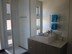  1 Blue Water Circle CAPE PATERSON VIC 3995 $595,000 This modern three bedroom townhouse offers only the best for seaside living in Cape Paterson. The home is highlighted by a superbly-appointed kitchen featuring stone bench tops, glass splashbacks, high gloss 2-pak white cupboards & drawers, and Bosch appliances. An attractive entry leads up a staircase finished with glass panel balustrading and to three huge bedrooms. Two bathrooms comprise of extra large showers and a spa bath. The list just keeps going ... and all within a short walk to the beaches, shops & Cape Tavern (three minutes) Read more at http://wonthaggi.ljhooker.com.au/22ZH9V#kkdB2Q3eeXQE7EAP.99 