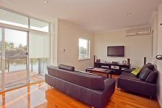  15/51 Tidewater Way Ascot WA 6104 $1,099,000 
 
 
 
 
 Magnificent tri-level home looking out over 
the river to the reserve beyond. This is magic right here in Ascot only 
15 mins to the city and 10 mins to the airport. 
Spacious open plan lounge, dining, kitchen opening up to a marvellous 
outdoor timber deck right on the river, watch the dolphins swim right 
by. 
Four bedrooms, two bathrooms, home in a secure complex. Outdoor 
balconies on all levels overlooking the water with downtown Perth as a 
backdrop. 
Expansive family room with a large outdoor...
 