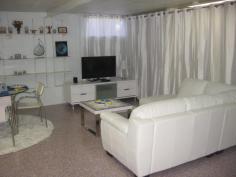  4 Bellicent Road Bracken Ridge Qld 4017 This beautifully presented spacious fully furnished ground level two bedroom apartment is self-contained complete with modern kitchen, bathroom, separate toilet, and access to washing machine and clothes line. Both bedrooms have built-in mirrored wardrobes with shelves and hanging space, and curtains. New furniture consists of white leather lounge, large television with white cabinet, round glass dining table with four stainless steel and white leather chairs, large fridge, beds and coffee table. The kitchen is complete with stainless steel gas cooktop with range hood, electrical appliances (microwave, toaster, and electric kettle), plates, mugs, glasses, cutlery, saucepans and cooking utensils. The apartment boasts a breezy open plan living area incorporating white and blue tones throughout. An undercover area outside is perfect for meals or enjoying the established tropical gardens. The property is fully fenced with front security gate offering privacy and security. 