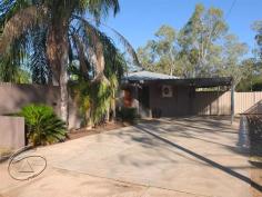  15 Arunga Street, The Gap NT 0870 COMFORTABLE COZY, CONVENIENT $355,000 Investors, first home buyers and downsizers must take a look at this delightful home, so well presented and so affordable! With a stylishly renovated kitchen, bathroom and laundry, there is nothing to spend.. it is cosy, comfortable and welcoming. - Attractive, low maintenance home on 966m2. Huge rear yard - Stylishly renovated kitchen, bathroom and laundry - Private front courtyard with Palms & views of MacDonnell Ranges - Neighbouring properties have experiencing lots of development/improvement - Affordable, perfect first home or investment Currently configured as a two bedroom home with spacious open plan living, sparkling new kitchen with gorgeous tiled splashback, one bathroom, carport for two vehicles, private fenced front alfresco courtyard, large back garden with rear lane access on a 966m2 block; it was formerly a three bedroom home that has been transformed to two bedrooms to create extra living space. It is the perfect size for a young couple, or baby boomers/grey nomads who are downsizing and are looking for something to 'lock and leave' when they travel. Features include: Split system AC to all main rooms, ceiling fans, good storage, well established tropical gardens and there is so much space in the backyard to either build a shed a games room or both!  Alfresco entertaining can be catered for in the front courtyard, fully fenced and private, with views of the stunning MacDonnell Ranges... indulge in a drink or two at sunset and watch the Ranges transform under the dusk hue: soak up this unique Alice ambience and vista, it's pretty special. Whether enjoying a BBQ with family and neighbours, or eating a lazy Sunday brunch whilst perusing the weekend papers, this is a cosy and intimate outdoor space, enhanced by not only the vista, but the leafy palms that frame the area. Located close to all amenities, the Alice Springs Bowling and Social Club and parks are within an easy walk, and major arterial roads and the city centre are easily accessed. This area has undergone quite a transformation in recent years with lots of investment in development and infrastructure; it has improved its amenity and appeal. One of the most affordable homes on the market today; both tenants and investors should take a serious look, for tenants this may be the opportunity to secure the key to the door of your first home! $25,000 First Home Buyers grant IF you act before 31 Dec 2014. 