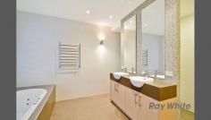  406 Mona Vale Rd St Ives NSW 2075  Sophisticated, Sleek, Superior Design Home - Downsizers Will Appreciate! An architect design home with spacious, light and bright interiors. Low maintenance living featuring 4 bedrooms, multiple living and entertaining areas ideal to enjoy all year round. Suitable for the whole family and enjoying a peaceful yet convenient location. - 4 bedrooms all with built-in robes including a generous master with dressing area and luxurious ensuite with separate shower and spa bath - Stunning kitchen with Caesar Stone benchtops, Miele appliances, gas cooktop and plenty of storage - Casual meals and living area opening outdoors to alfresco entertaining deck - Large main bathroom with spa bath and separate shower - Separate study with built in storage, formal lounge and dining room all open outdoors to a second entertaining deck and garden - High ceilings, polished timber floors - Double car accommodation and lock up storage area - Ducted reverse cycle air conditioning - Superb level, landscaped block - Close proximity to St Ives Shopping Village, transport, local and prestigious private schools 
