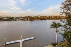  4/88 Macquarie Street St Lucia Qld 4067 Please call Jason Adcock to register for private inspections Saturday's and Wednesday's. 
 
With just one apartment per floor, St Lucia's Waterford complex offers 
an indulgent rarity - expansive full level living across some 348m2 with
 panoramic river views, premier pontoon and pool facilities and a 
picturesque position in a truly superlative locale. 
 
Built far out into the riparian, each apartment has been designed to 
maximise the views with a sprawling terrace projecting out 
significantly, directly towards the water. Not only does this bring a 
rare level of privacy but also an uninterrupted 180 degree panorama that
 encompasses two wide stretches of the river, parkland, Toowong and the 
CBD. Additionally, being on the fourth floor, this particular apartment 
enjoys an almost perfect elevation - high enough to elicit far-reaching 
views but close enough ensure a strong connection with all the goings on
 of the river. 
 