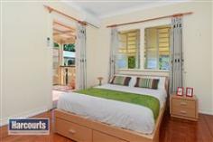  105 Blackwood Street Mitchelton QLD 4053 Low Set Queenslander on 812m2 Mid-High $600,000's Move straight in and take advantage of the attention to detail this fantastic home has received. Relax on the large covered rear deck with friends and family while the kids play in the expansive back yard. Situated in one of Mitchelton's most iconic addresses, Blackwood Street is known for its leafy environment, family atmosphere and proximity to transport, shops and cafes. This large home is perfect for a growing family looking for a place to enjoy for years to come.  With Features That Include: Large separate dining and living rooms with air-conditioning Over 35sqm of covered outdoor living space Large kitchen with ample bench space and breakfast bar Stainless steel kitchen appliances with gas cook top King sized master suite with ensuite and air-conditioning Large additional bedrooms with private balcony access for two Generous separate laundry with external access 2kw 10 panel solar system Gas hot water system Rear garage is perfect for a car/workshop Additional 9 sqm garden shed Fully fenced 812sqm block with rear vehicle access  Distances: Mitchelton Train Station - 400m General Features Property Type: House Bedrooms: 4 Bathrooms: 2 Land Size: 812 m² (approx) Indoor Features Ensuite: 1 Air Conditioning Outdoor Features Garage Spaces: 1 Other Features Property condition: Excellent Property Type: House House style: Lowset Mid-High $600,000's 