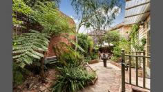  16/20 Princes Street, St Kilda, VIC 3182 Wonderfully secluded and with its own leafy courtyard, this fantastic one bedroom apartment is the perfect change of pace. On its own title and positioned at the rear of the block, this peaceful pad is splashed with original timber floors and ornate ceilings, and showcases a light-filled central living area, kitchen with island bench, pendant lighting, and stainless steel Ariston appliances, sizeable bedroom, and retro bathroom with charming leadlight window and laundry with Samsung washer dryer. The sensational courtyard garden has a north-westerly aspect and is an idyllic spot for alfresco meals or just having a relaxing drink on a balmy summer's night, while additional features of this residence include a large outside storage shed, heating, and air-conditioning. A great opportunity for first home buyers and in a vibrant location only a stone's throw to Fitzroy Street and Acland Street cafes and restaurants, Albert Park Lake, MSAC, St Kilda Beach, Chapel Street, and public transport. 