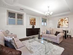 
 472A Whitehorse Road 
 Surrey Hills 
 Vic 
 3127 
 This tri-level, double glazing, high ceilings luxury home faces north
 with trams stop at your doorstep to Box Hill Central and walking 
distance to Balwyn shopping strip. 

 Ground level comprises formal living room (or large bedroom with 
en-suite). Exquisite tiling continues to the open plan kitchen, dinning,
 family area open to enclosed alfresco deck for entertaining, the 
kitchen boasts high-gloss cabinetry with soft-close doors and drawers, 
stainless steel Euro appliances and Caesar Stone benchtops. 

 On the top floor has a retreat, 3 bedrooms (all with Daikin Inverter 
split systems), 2 with built-in robes also share a Caesar Stone bathroom
 with frameless showers and toilets, the master bedroom with an en-suite
 boasts a walk-in wardrobe and a north-facing balcony accessed through 
double-glazed doors. 

 On the lower ground floor, a remote 4-car garage features a turntable
 for effortless parking and access, adjoining storerooms/cellar. Slab 
heating in rumpus and 5th bedroom with en-suite. The flexibility of this
 space may suit independent teens or may serve as an entertainment zone. 

 Other features include double-glazing, secure video intercom access, 
ducted heating, Inverter split systems, ducted vacuum, slab heating, 
gas-boosted solar hot water, immense storage and an electric water 
drainage system. 
 