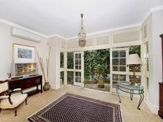  40 Fairfax Rd Bellevue Hill NSW 2023 Elegantly dress circle positioned on a big block, this sun-splashed 
hideaway has been restored/renovated for poolside entertaining. This 
remarkable home combines grand classic traditions with modern essentials
 & large proportions. Quietly convenient, within easy walking 
distance of Cranbrook & Scots College, Double Bay shops, cafes, 
transport & beach, this home is simply extraordinary. 
 
+ Expansive private garden, sunny pool (gas heated, self-cleaning), bbq area 
+ Drawing room (Jetmaster gas fireplace), sunroom, formal dining room 
+ Library/sitting room, separate sunroom with fully appointed cocktail bar 
+ Open plan family living/dining areas adjoin granite gas European kitchen 
+ 6 full-size bedrooms (b/ins), separate upstairs sitting room/teenage retreat 
+ Air con, high ceilings, bay windows, parquetry floors, internal laundry/wc 
+ Parking for 2 cars, wine cellar, attic store, full security 
 
 Seldom is so much style, space & flexibility on offer in such a prime location 